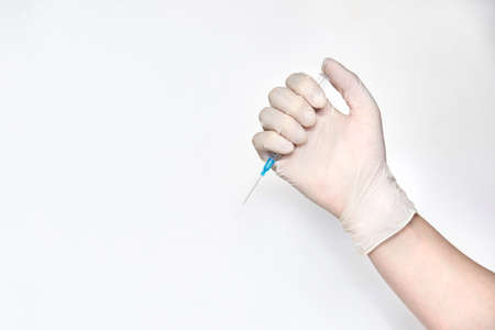 Doctor hand holf medicine vaccine. Anti virus health treatment. Medical nurse surgical. Pharmacy laboratory. Reseach center. Covid concept. Safety anaesthetist procedure. White backgroundの写真素材