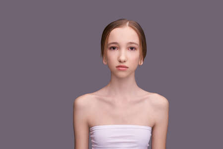 Young woman cosmetology portrait. Beauty girl face. Anti acne treatment. Home routine skincare....