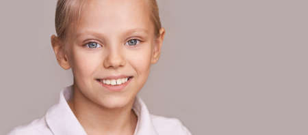 Young beauty girl portrait. Look at camera.