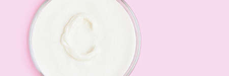 Collagen powder with pink background.