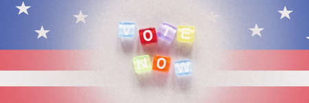 Vote Now lettering with USA flagの写真素材