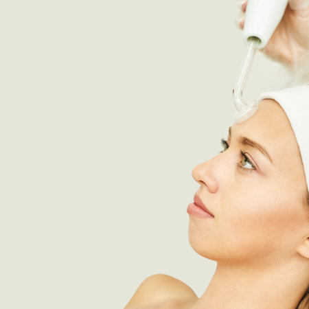 Darsonval cosmetology apparatus. Face clean procedure. Salon treatment. Professional dermatology hardware. Electric equipment. Medicine device. Removal acne. Dermatology. Detox therapy. Rejuvenationの写真素材