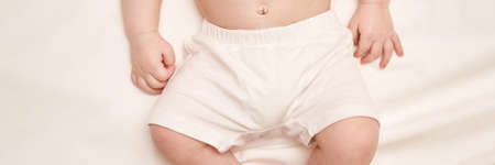 Little child feet. Toddler legs. Kid panty. Baby person. Tiny health care. White children underware....