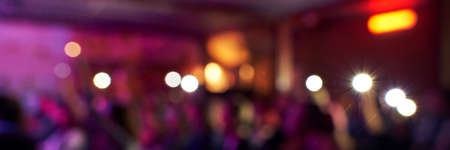 Blur night banner. DJ concert party. Dance silliuette. Musician shadow theater. Pink and pruple. Christianity show concept. Live stage church. Event lights. Fun festive group. Horizontal bannerの写真素材
