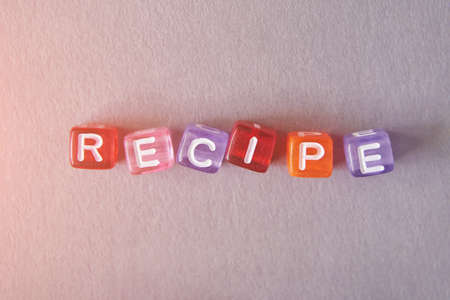 Cupcake quote design. Typography concept. Creative text wallpaper. Phrase grey paper background. Sweet food concept. Holiday delicious snack. Cube bright lettersの写真素材