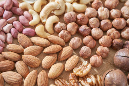 Different nuts. Home kitchen. Protein and fat food. Mix seeds. Raw whole snack. Munchies. Natural...