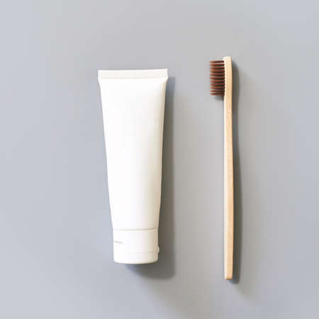 Ecology toothbrush on grey background. Brush on table. Sustainable mouth product. Zero waste...