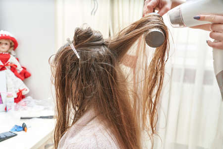 Mother dry daughter long hair. Home activity. New normal. Barber equipment. Lifestyle kid hairdress....