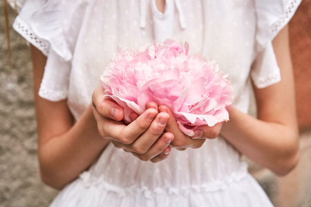 Peony pink bouquet. Female people holding flowers. Faceless lifestyle concept. Summer postcard. Anonymous trend person. Pretty valentine pion. Gorgeous bloomの写真素材