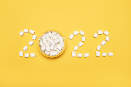 2022 numbers. Happy new Year sign. Start january idea. Creative postcard. Resolution concept. Modern...
