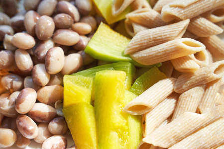 Eating healthy food. Organic calcium salad with vegetables and oil. Round plate. Home dinner or lunch. Vitamin cereal. Bowl at tableの写真素材