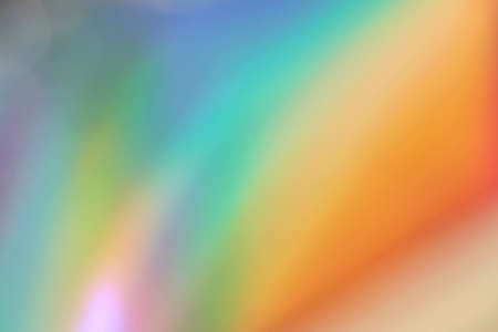 holograph foil background. Pastel color paper. Retro trend design. Vintage fantasy cover. Chrome holo art. Modern effect. Rainbow metallic material. Fabric glitchの写真素材