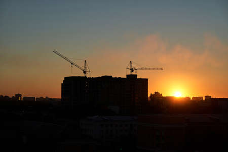 Night morning skyline. Sunny weather. Beatiful silhouette. Cityscape beauty coastline. Evening sun downの写真素材