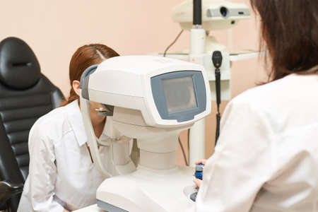ophthalmologist medical patient. Eye clinic treatment. Hospital optics equipment. Choosing vision pain eyedrop. conjunctivitis diagnosis doctor. optometry allergy painの写真素材
