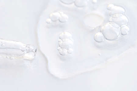 Serum gel texture swatch. Transparent drop with bubbles. Face skincare product. Liquid oil essence. Beauty smear. Vitamin collagen splash. Organic peeling treatment. Body health careの写真素材