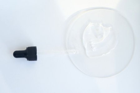 Serum gel texture swatch. Transparent drop with bubbles. Face skincare product. Liquid oil essence....