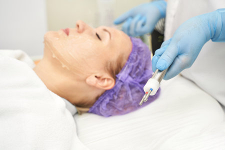 Dermatology anti age treatment. Microcurrent medicine procedure. Woman skin care. Aesthetic peeling...