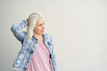 Pure skin care mature beauty portrait. Profile side view. Anti wrinkle senior cream. Female head. Medical treatment clinic. Woman nature makeup. Outdoorsの写真素材