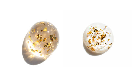 White cream with gold leaf flakes on white background - skincare and beauty concept for cosmetic...