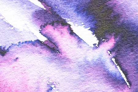 Abstract watercolor art with pink and purple brush strokes and textured paper background.の写真素材