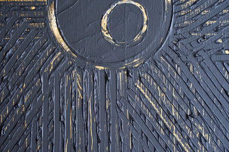 Abstract textured painting with circular motif and radiating lines in grey and gold.の写真素材