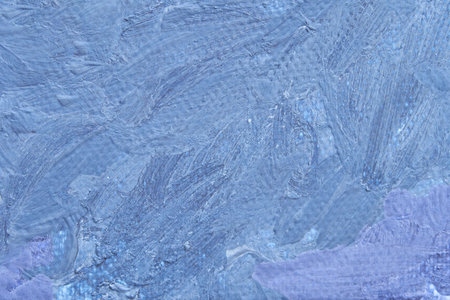 Blue textured abstract art with brushstrokes in various shades and patterns.の写真素材