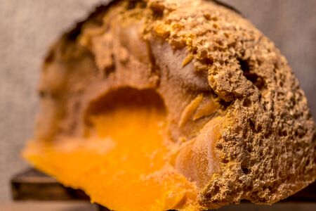 Cheese gourmet Mimolette. Healthy food background. Healthy fresh nutrition. Soft focus.の写真素材