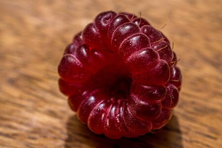 Rustic raspberry close up macro. Nature background. Fresh fruit. Natural product.
