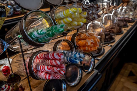 Bayonne, France. 29.06.2020. Candy boutique handmade on dark background. Handmade style. Chocolate background. Luxury style.のeditorial素材