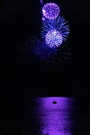 Festive fireworks on the french seaside. Beautiful for celebration design. Colorful fireworks. Festive event. Abstract background. Bright beautiful star. Scenic view.の写真素材