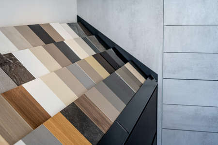 Samples of interior furniture material. Wooden pieces on shelf. Close up