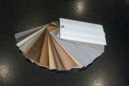 Samples of interior furniture material on a black background. Close upの写真素材