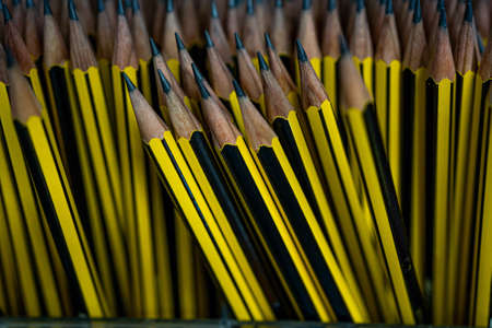 Yellow pencils in stock for school. Selective focus close up. High quality photoの写真素材