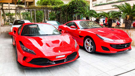 Monte-Carlo, Monaco. 10.09.2020 Two red Ferraris parked on the street in Monte-Carlo. Ferrari is Italian sports car.のeditorial素材