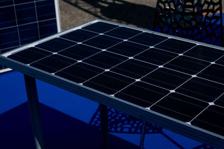Photovoltaic table modules for renewable energy. Save the earth and the energy with good environment concept. Alternative clean green energy concept.の写真素材