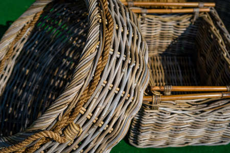 Background of basket surface. Pattern background. Wicker straw Basket. Handcraft weave texture natural wicker, texture basket. Close-upの写真素材