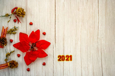 Christmas decoration background over wooden white table background. Top view with copy space for...