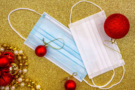 Christmas greeting card for medics concept. Two surgical protective masks: for adult and for child....