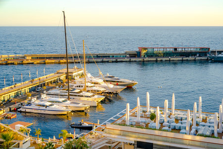 Monte Carlo, Monaco 29.11.2020 Sailing boats yachts and modern vessels in port on seascape background. High quality photoのeditorial素材