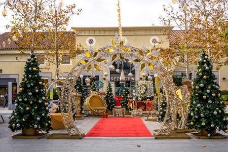 Villeneuve-Loubet, France 01.12.2020 Background of scenery Christmas holiday decorations with chair for making photo with Santa- Claus. Shopping mall background. High quality photoのeditorial素材