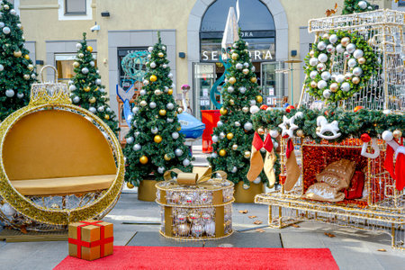 Villeneuve-Loubet, France 01.12.2020 Background of scenery Christmas holiday decorations with chair for making photo with Santa- Claus. Shopping mall background. High quality photoのeditorial素材
