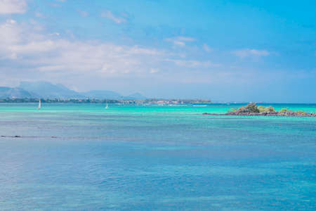 Mauritius island - 10.31.2021: Coast sea water view, island turquoise waters, sea activities, ripple waves aqua texture sea, nature. High quality photoのeditorial素材