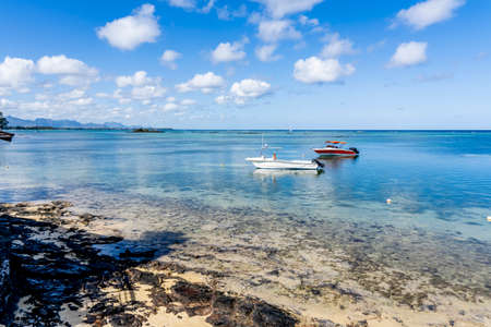 Mauritius island - 10.31.2021: Coast sea water view, island turquoise waters, sea activities, ripple waves aqua texture sea, nature. High quality photoのeditorial素材