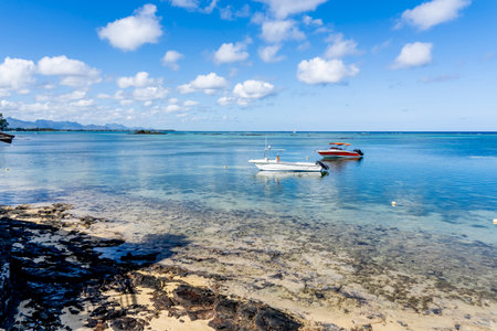 Mauritius island - 10.31.2021: Coast sea water view, island turquoise waters, sea activities, ripple waves aqua texture sea, nature. High quality photoのeditorial素材