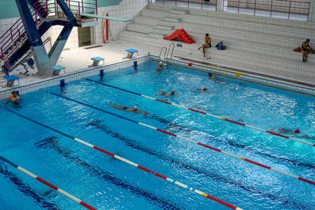 Nice, France - 14.08.2020: Indoor Swimming Pool with diving platform for jumping at swimming pool....