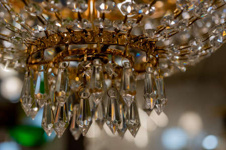 Close up of glass chandelier. Bright lights Decor Crystal Chandelier. High quality photoの写真素材