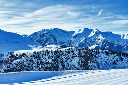 Snow mountain in winter. Concept of winter recreation in the mountains. Beautiful winter background....
