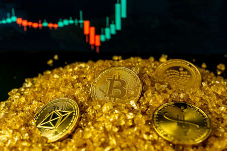 Altcoin and Bitcoin on the gold crystal mineral stone mountain. Stock Growth blurred background....