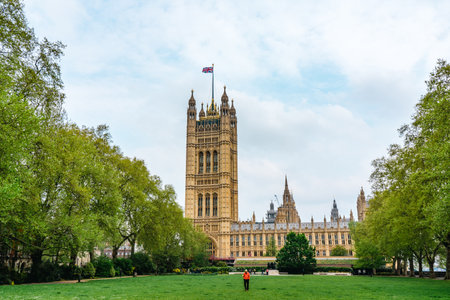 London, UK - 23.04.2022: House of Parlament, Victoria Tower and the Palace of Westminster. Tower Gardens view in spring sunny day. Hight quality photo.のeditorial素材