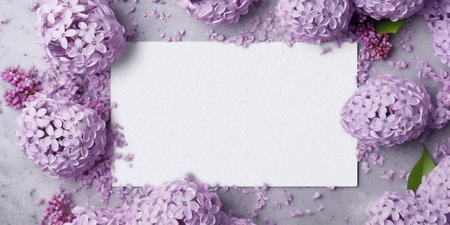 Blank white card in the center, surrounded by lilac flowers, white background top view. AI...